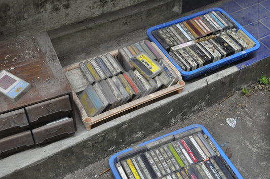 cassettes in trays on the ground