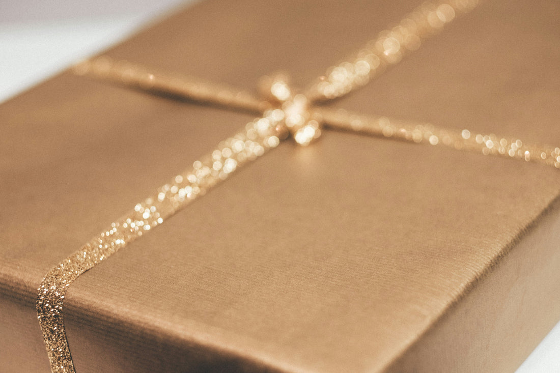 golden gift with golden ribbon