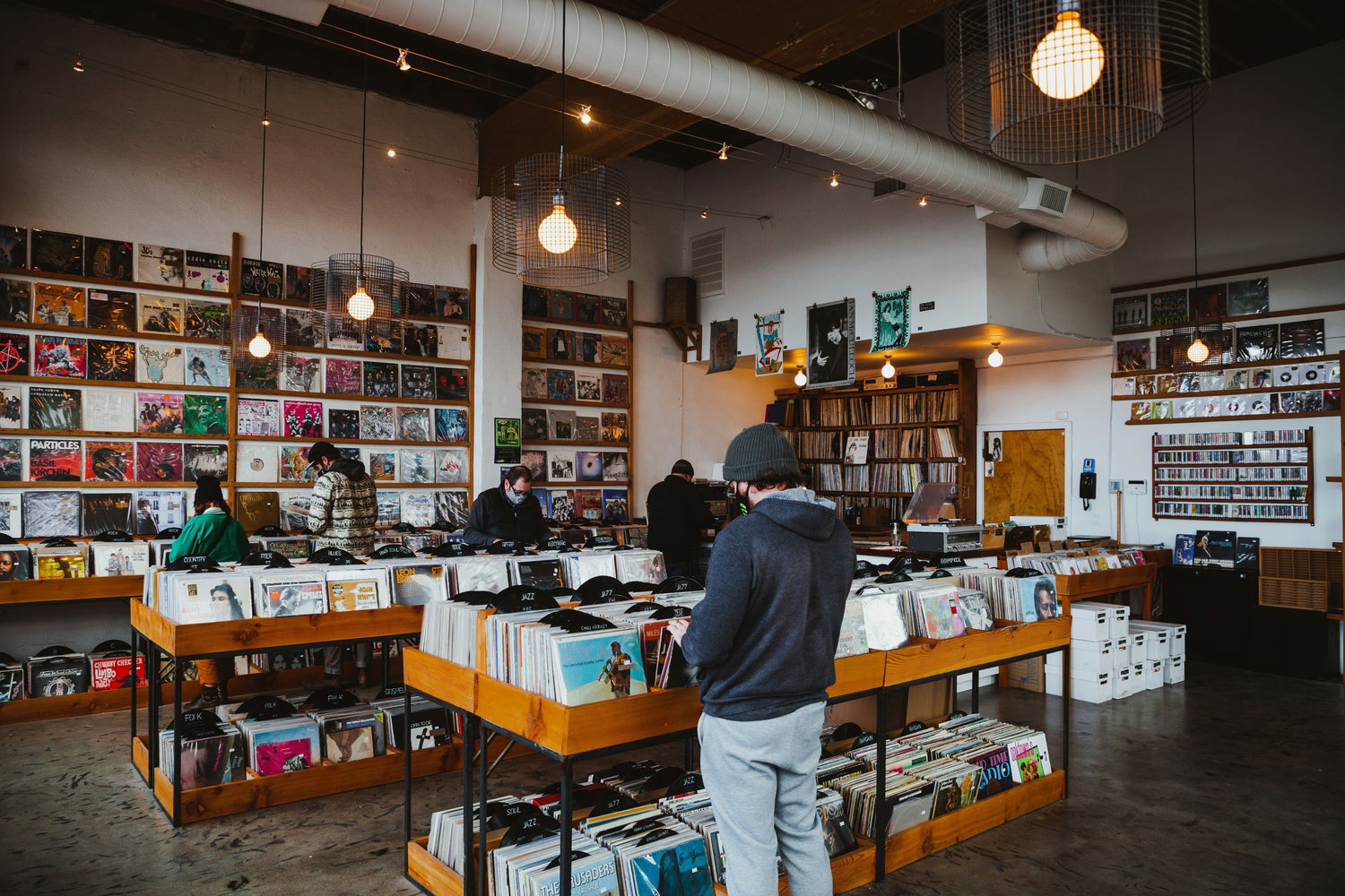 Vinyl store with people browsing 